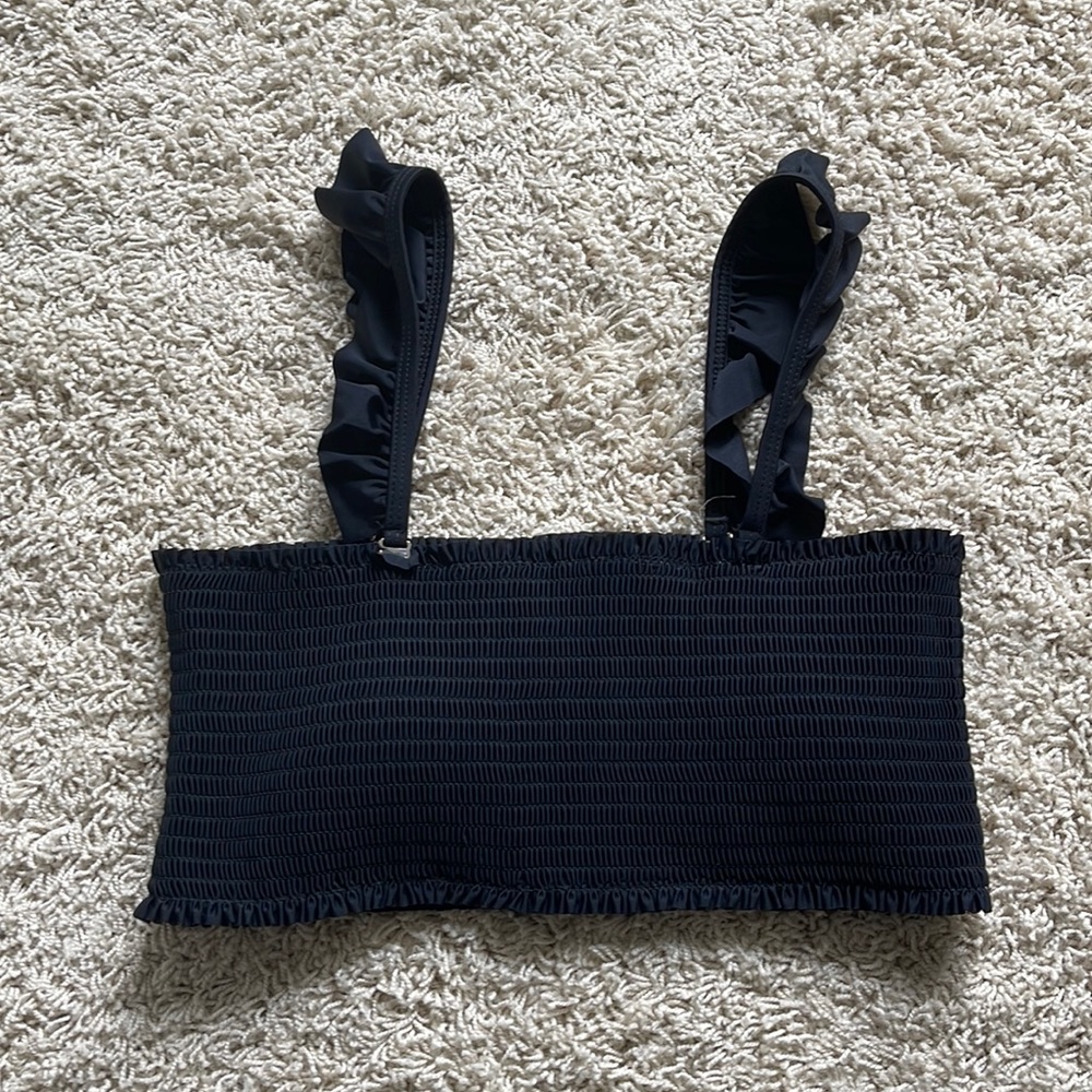 NWOT Black bathing suit top with ruffle straps.